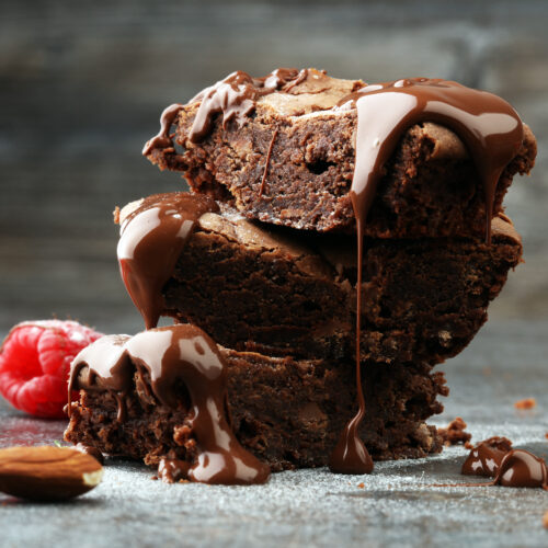 homemade chocolate brownies on grey background